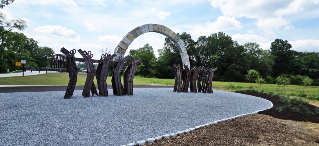 Public art installation site with slate plaza and new beds