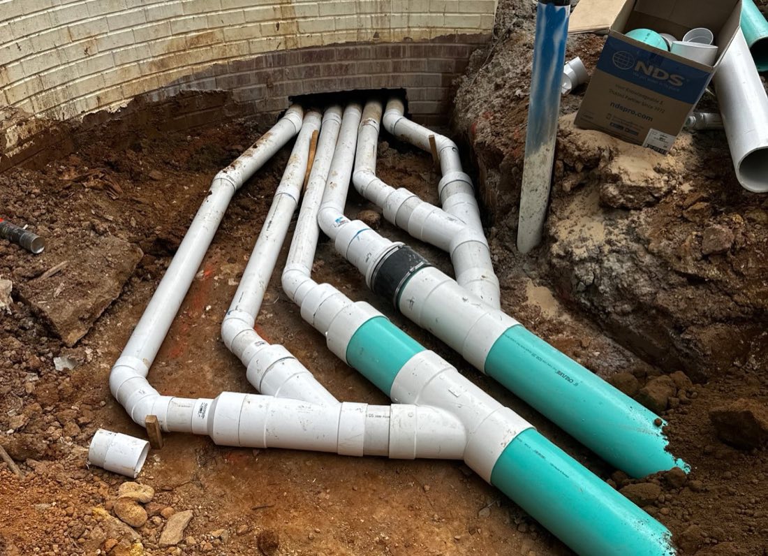 Downspout piping manifold going in below grade