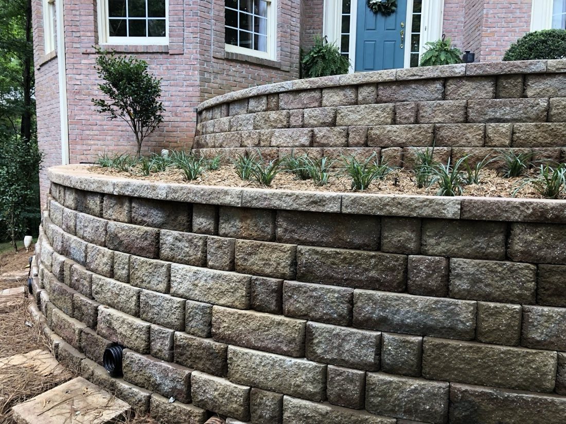 Curved segmental retaining wall, planted on top